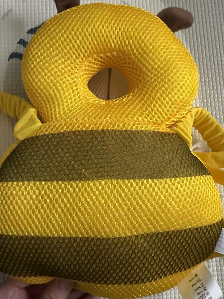 Customer photo showing the Buzzy Bee cushion